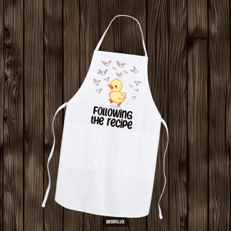 Funny duckling apron featuring a happy duckling trailing swooping birds, perfect for chefs and home cooks who love humor.