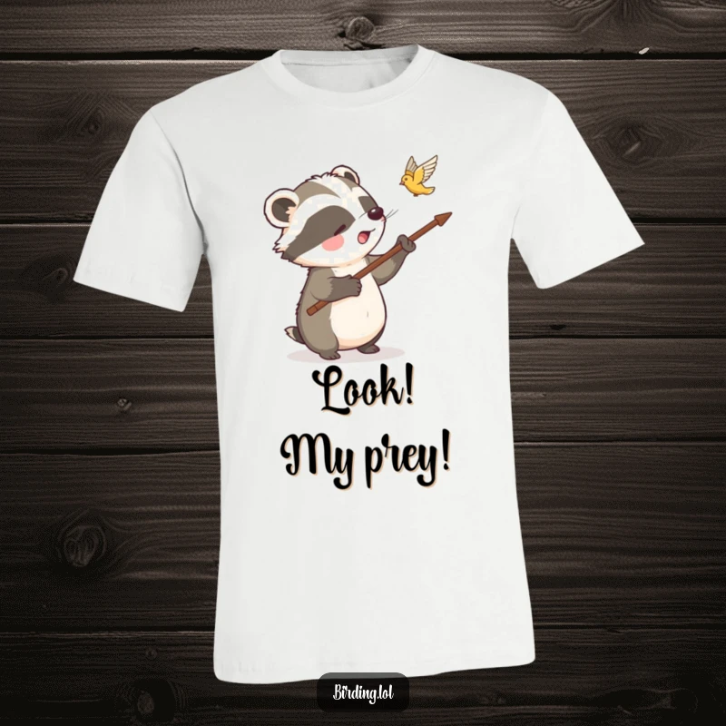 Funny badger t-shirt of a delighted badger pointing at a flying bird with a stick, great for nature lovers and humor enthusiasts.